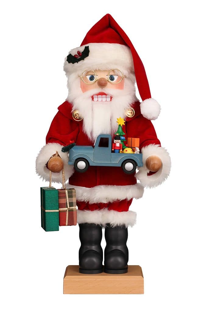 Nussknacker Weihnachtsmann mit Spielzeugauto - Auslaufartikel