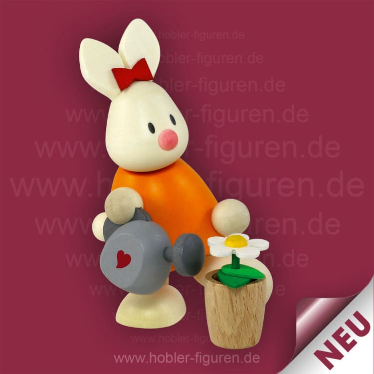 Kaninchen Emma mit Gießkanne und Blümchen