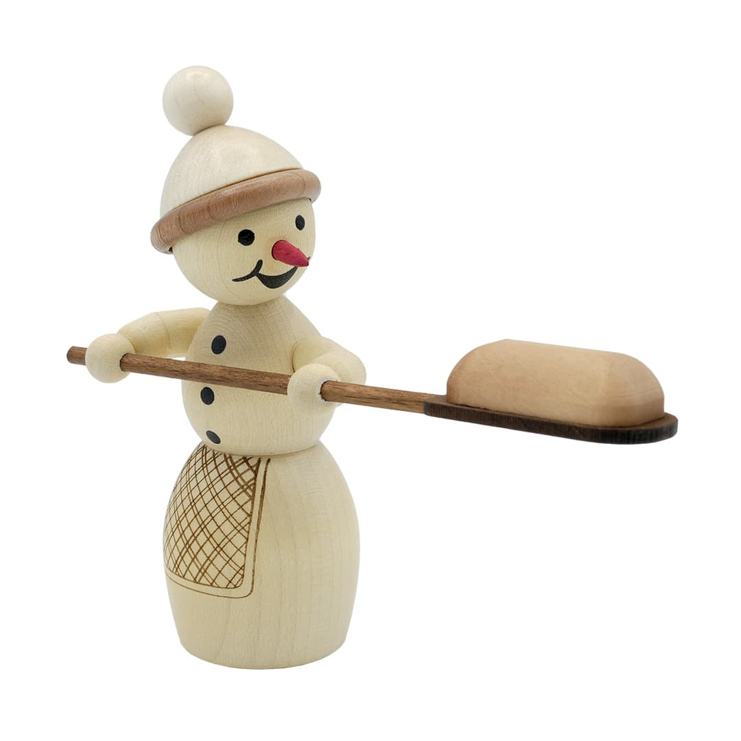 Schneefrau als Stollenbäckerin