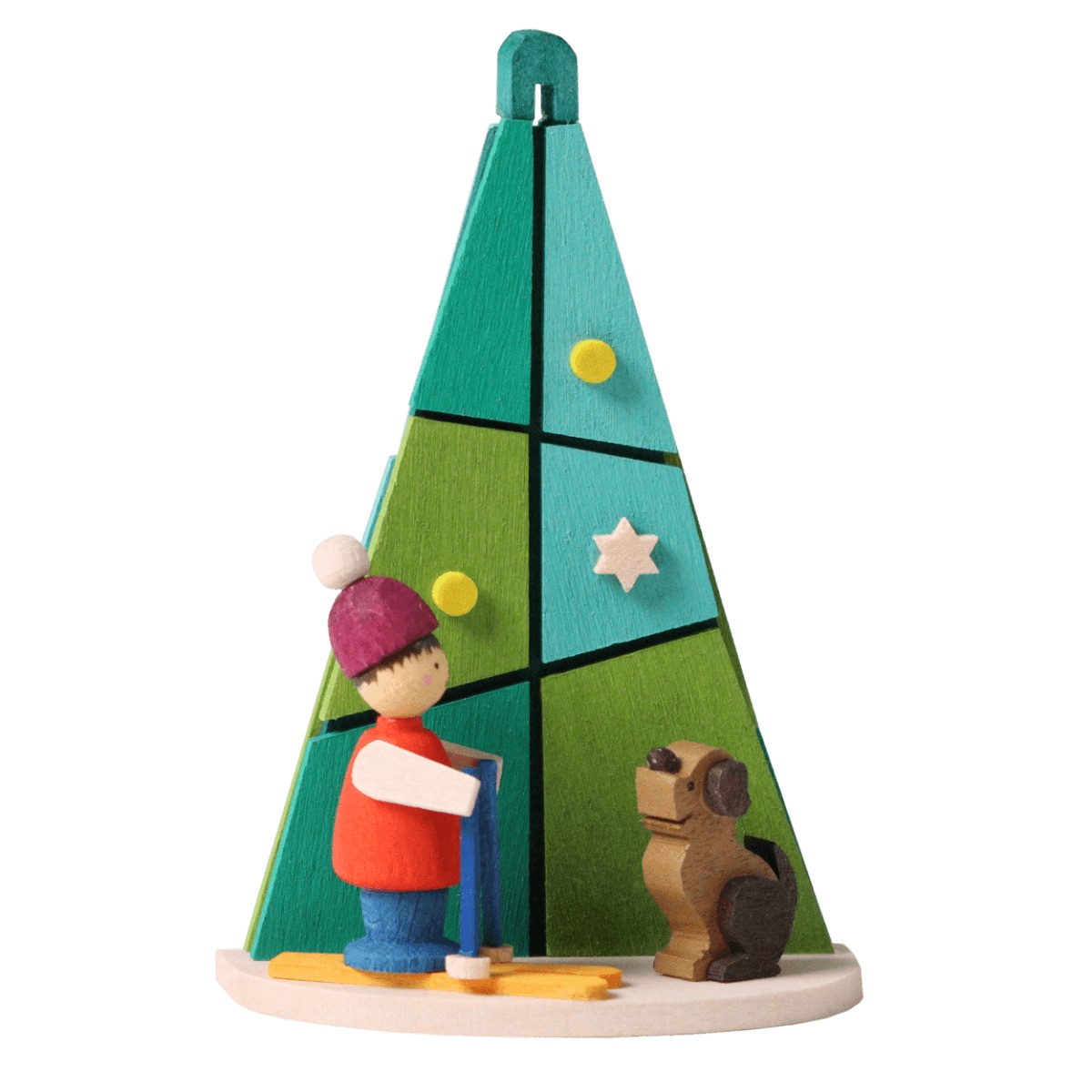 Baum mit Winterkind und Hund als Baumschmuck