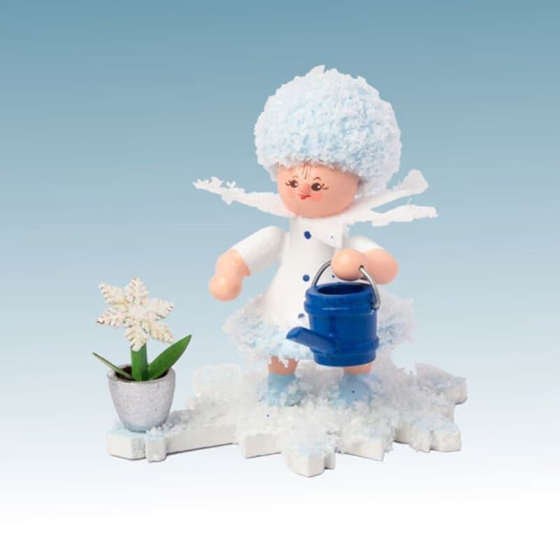 Schneeflöckchen mit Gießkanne