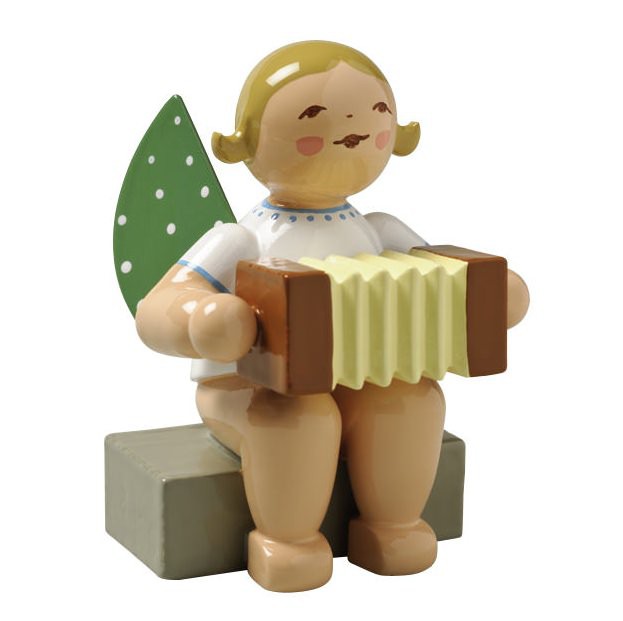 Engel mit Harmonika sitzend