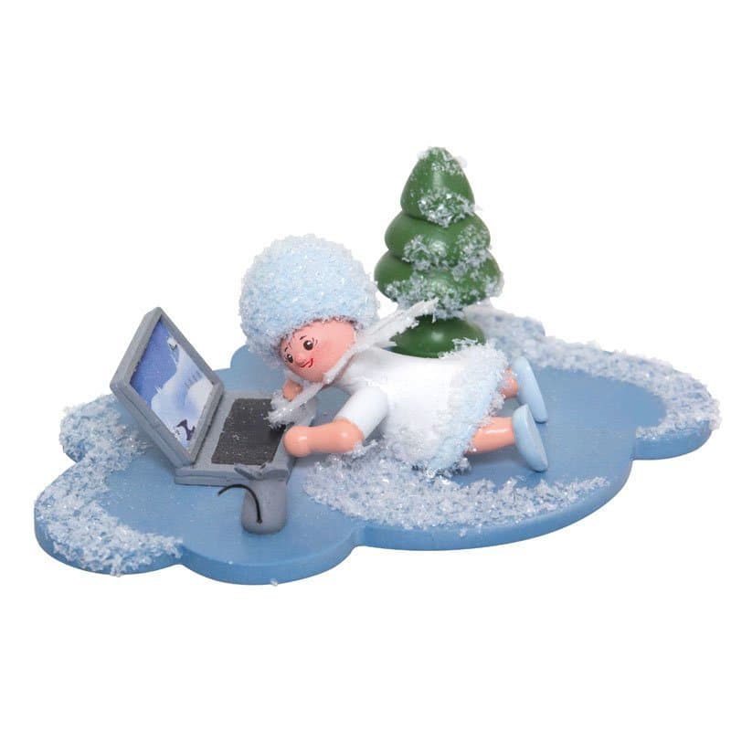 Schneeflöckchen auf Wolke am Laptop