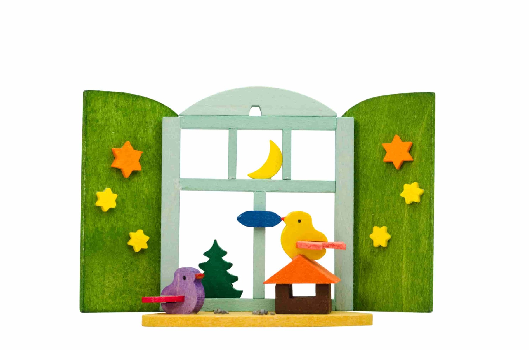 Weihnachtsfenster mit Vogelhaus als Baumschmuck