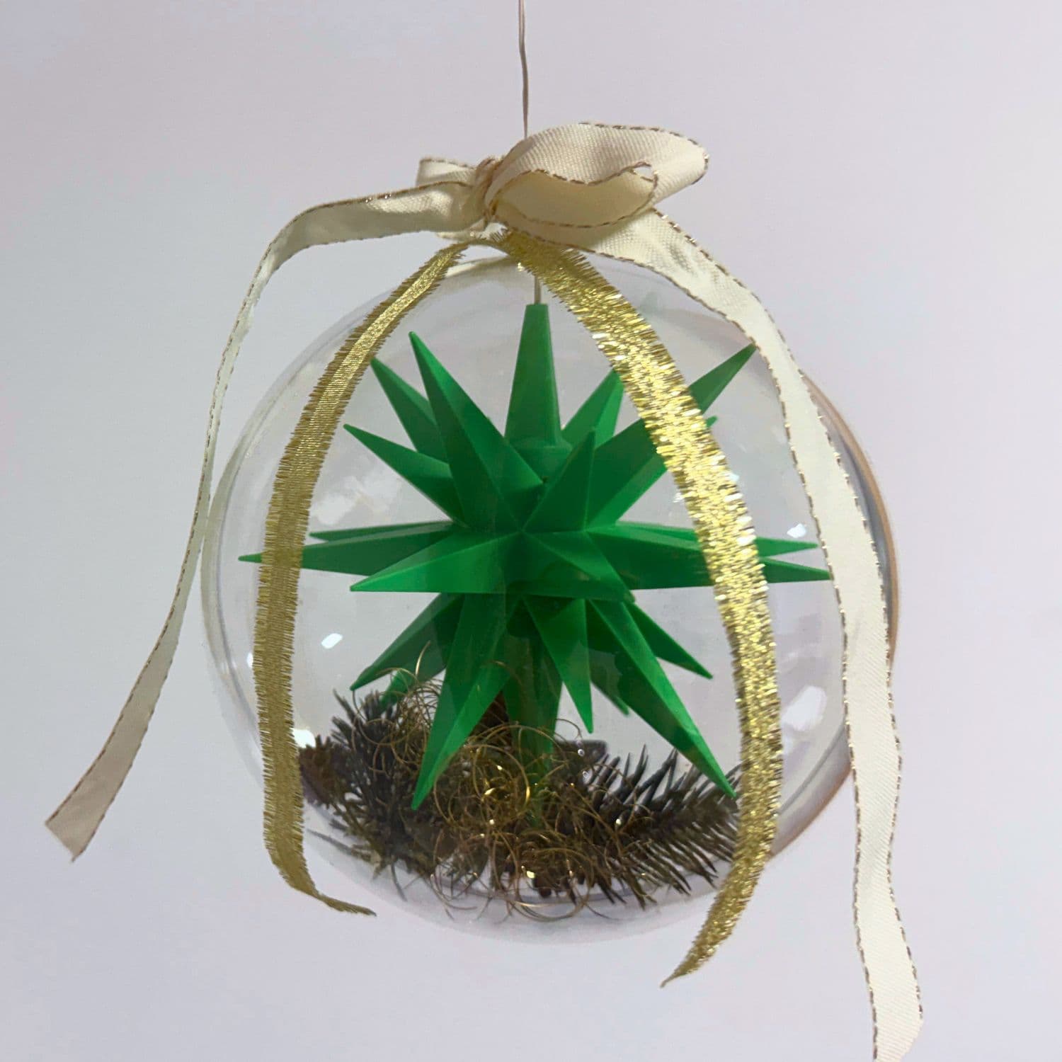 Original Herrnhuter Stern in Weihnachtskugel - grün