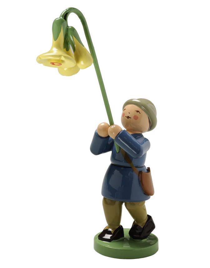 Junge mit Schlüsselblume