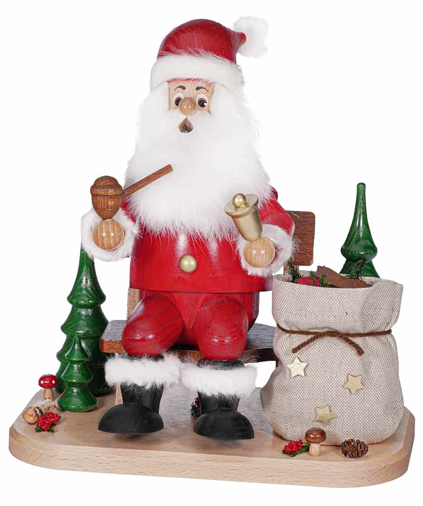 Räuchermann Weihnachtsmann auf Bank mit Sack- Auslaufartikel