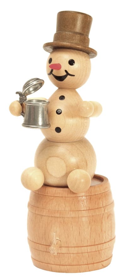 Schneemann mit Krug auf Bierfass