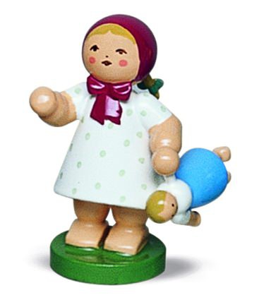 Mädchen mit Puppe