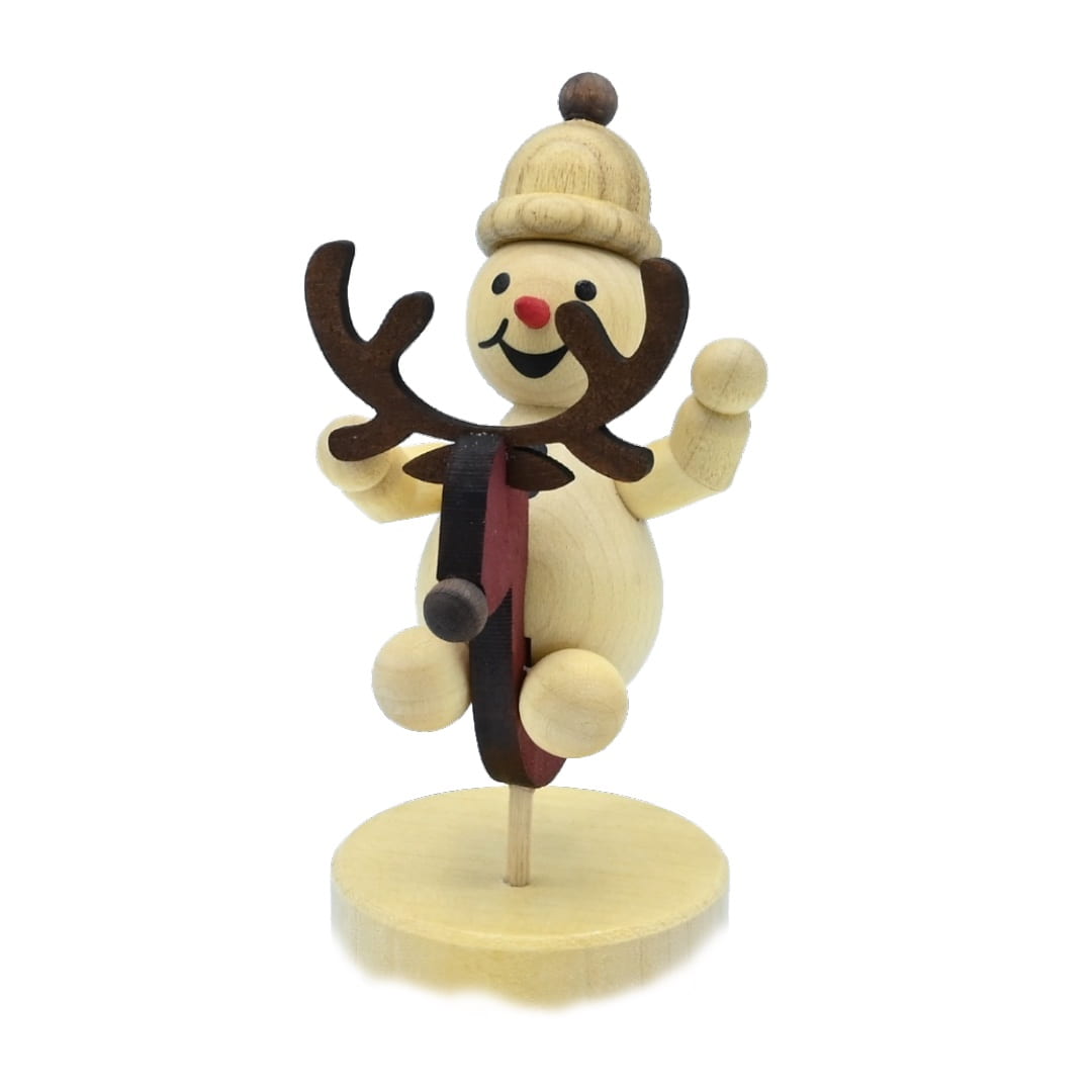 Schneemann Junior auf Schaukeltier