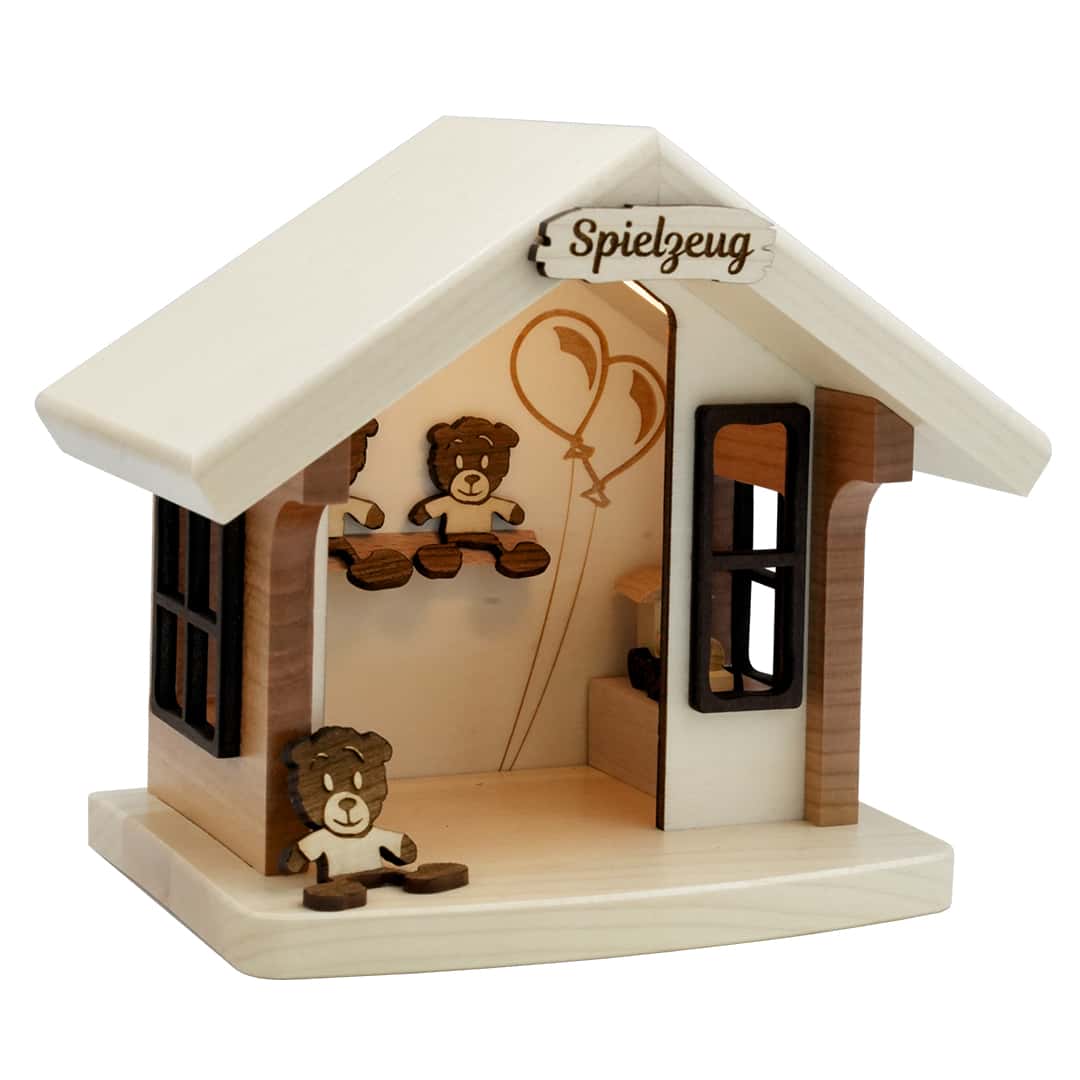 Weihnachtshütte Spielzeug beleuchtet