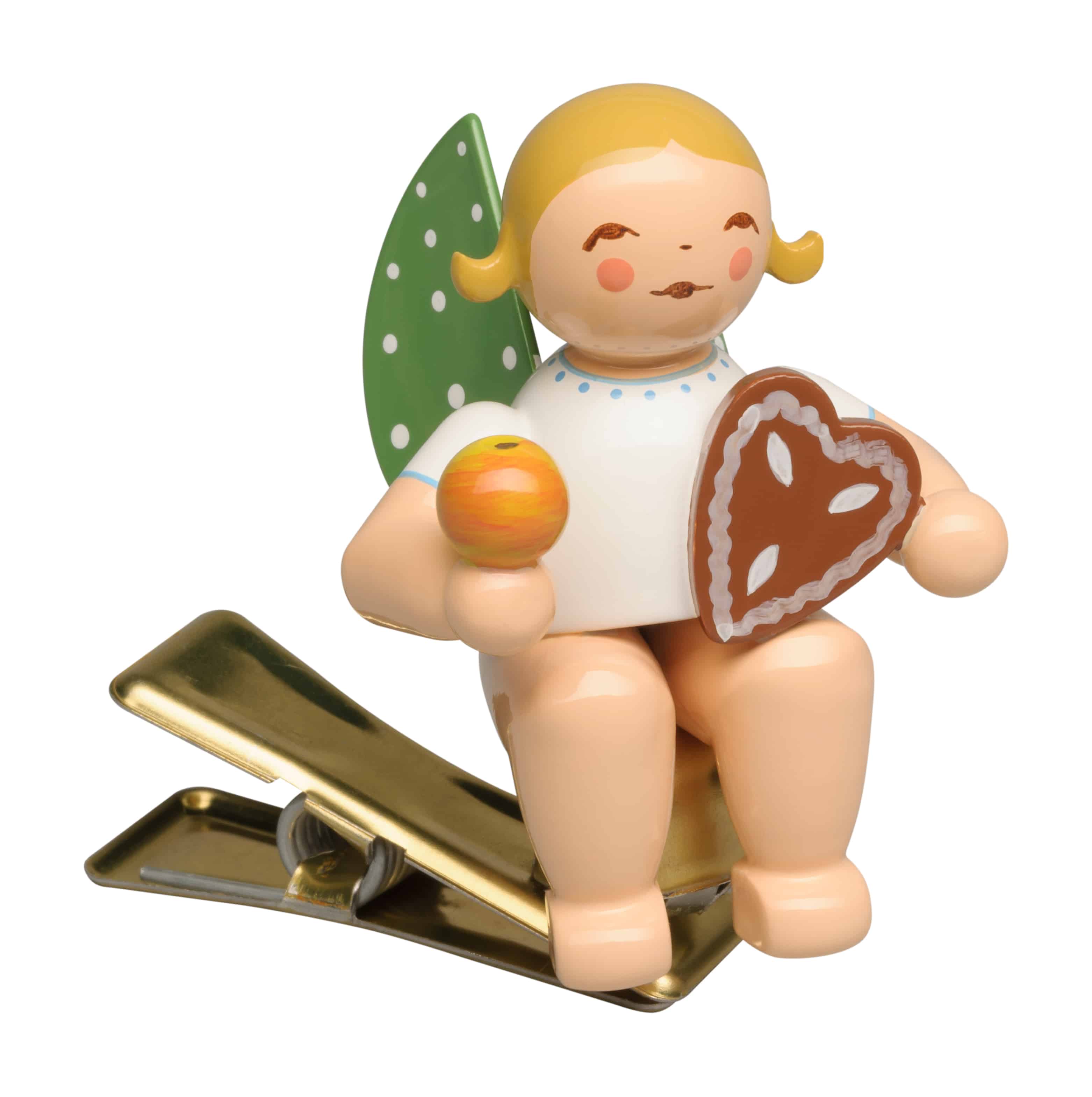 Engel mit Lebkuchen und Apfel auf Klemme