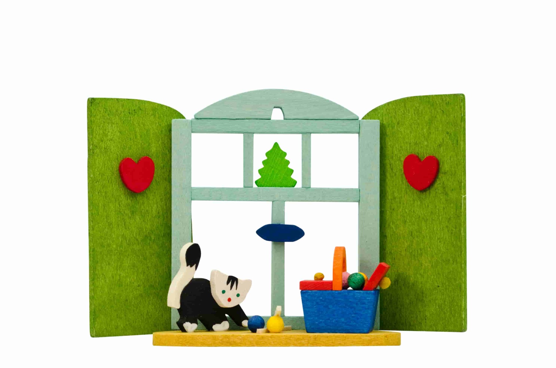 Weihnachtsfenster mit Katze als Baumschmuck