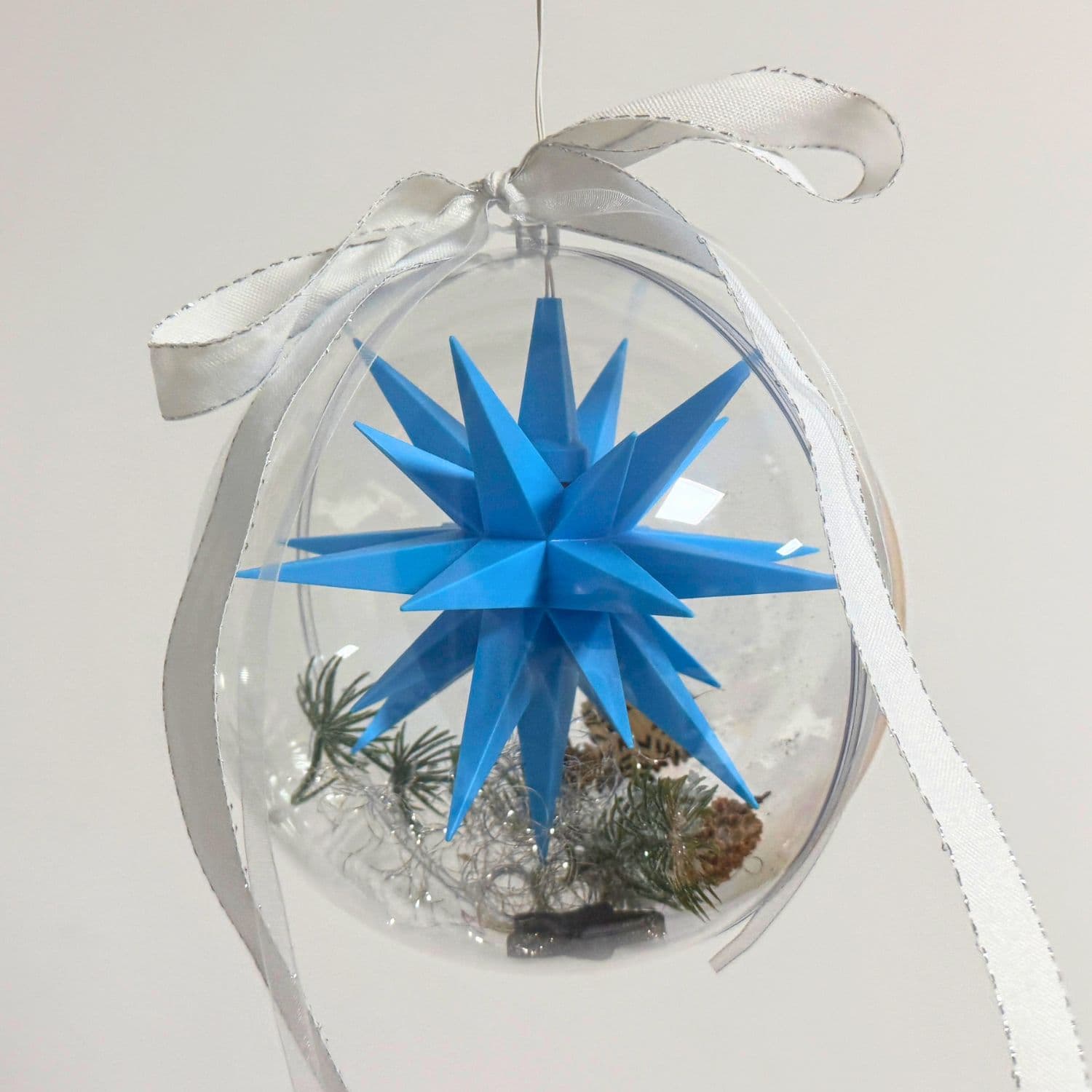 Original Herrnhuter Stern in Weihnachtskugel - blau