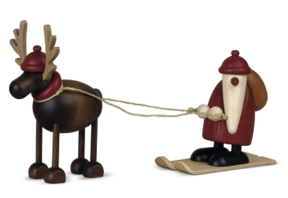 Rentier Rudolf mit Weihnachtsmann auf Ski