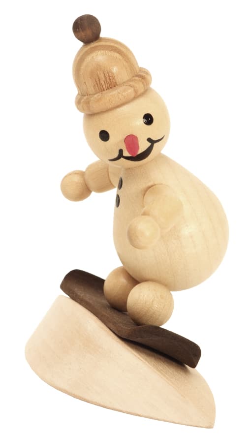 Schneemann Junior auf Schneewehe mit Mütze - Auslaufartikel