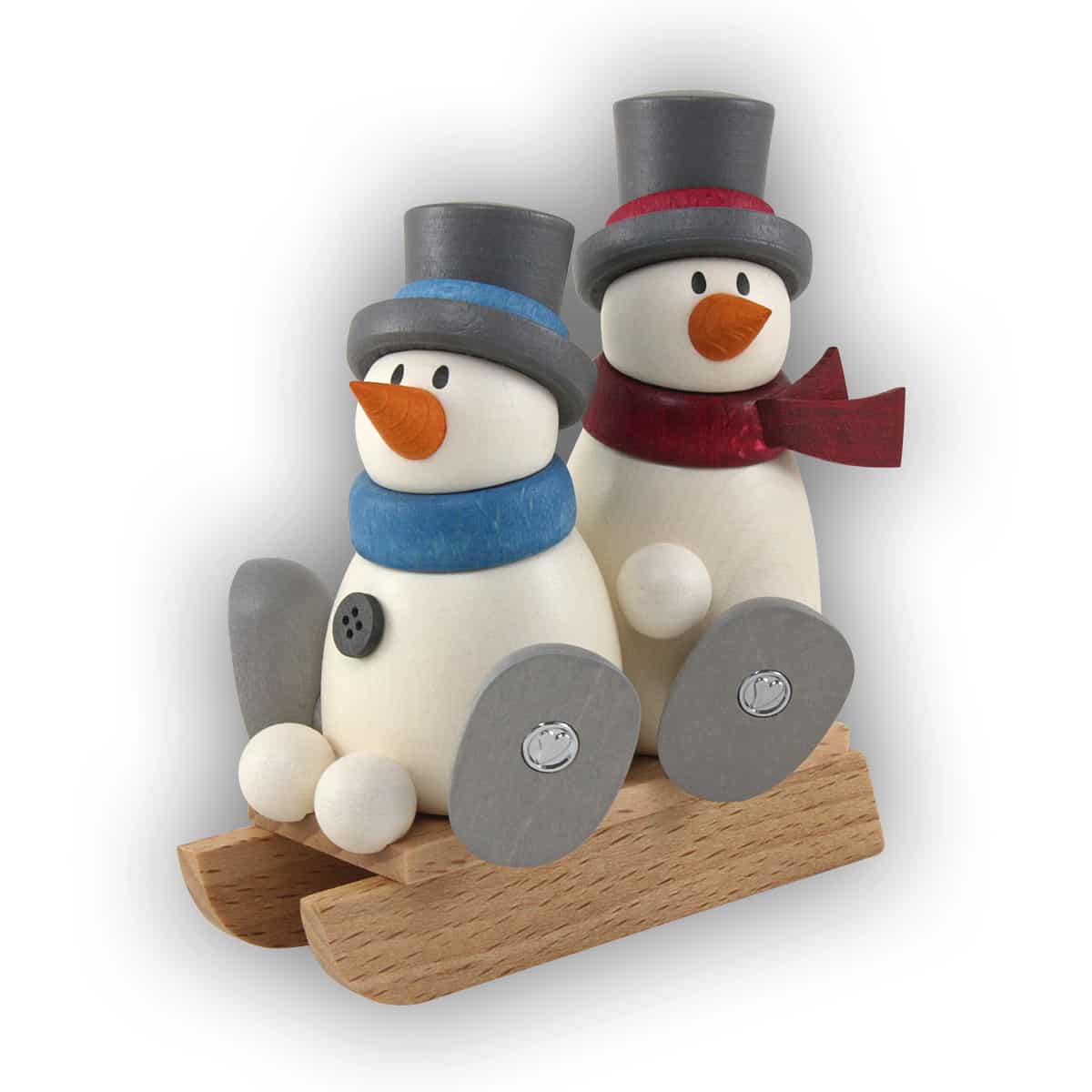 Schneemann Fritz und Otto auf Schlitten