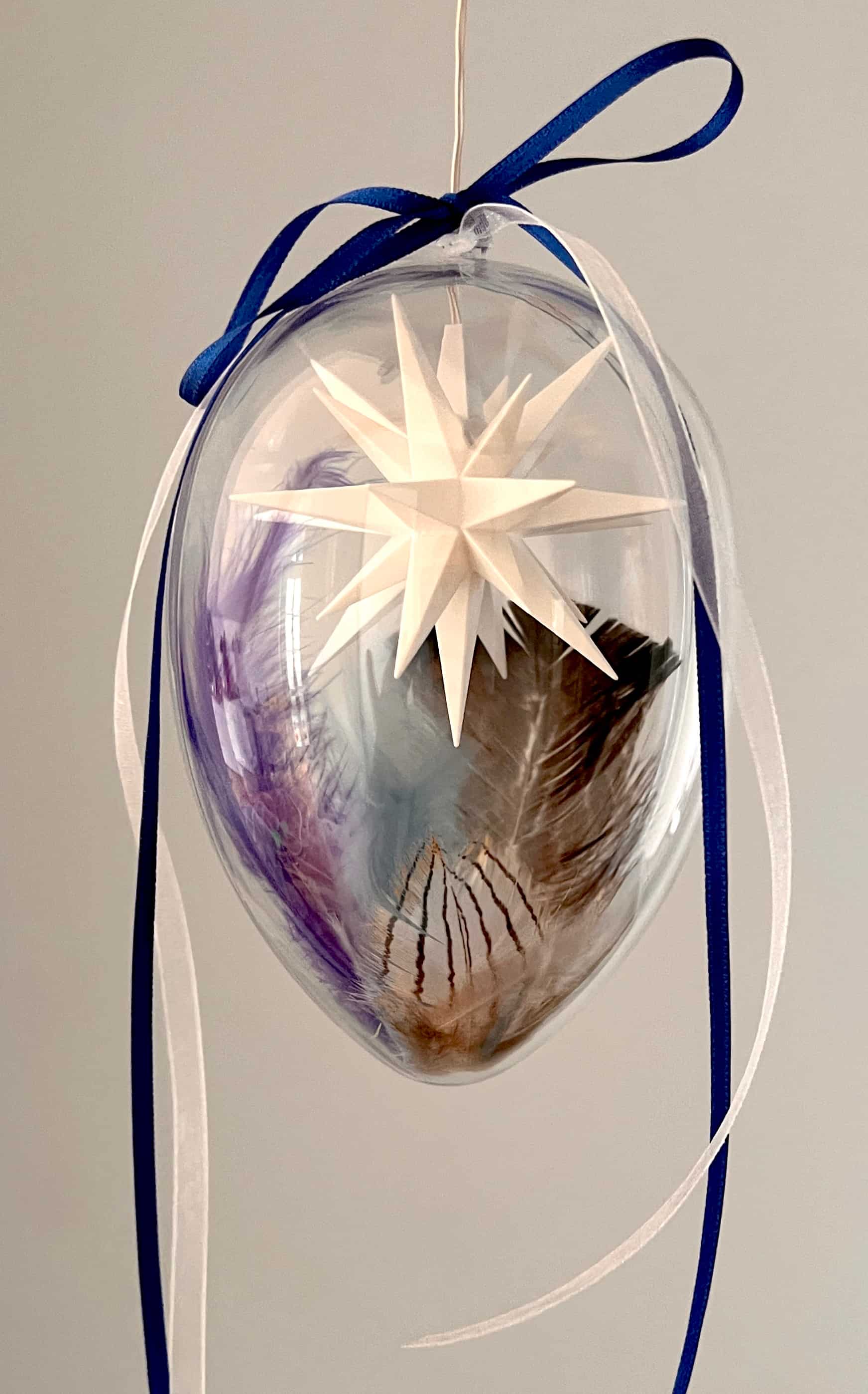 Original Herrnhuter Miniaturstern im Osterei - blau/weiß