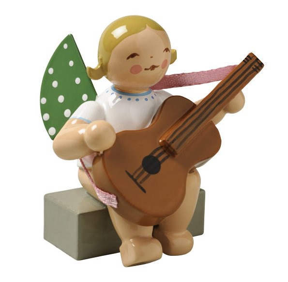Engel mit Gitarre sitzend