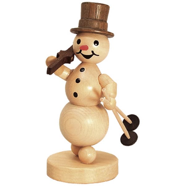 Schneemann mit Ski auf Schulter