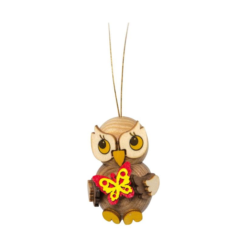 Baumbehang Eulenkind mit Schmetterling